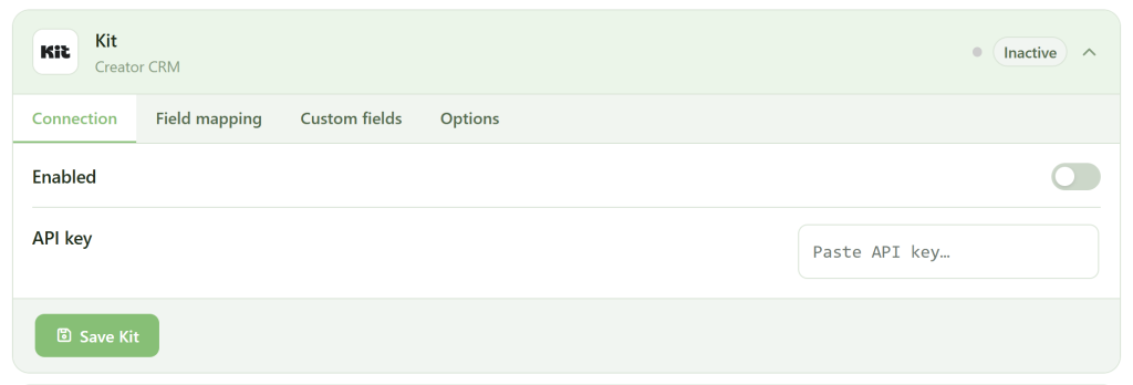 A web interface for the "Kit" Creator CRM shows tabs for Connection, Field mapping, Custom fields, and Options. The "Enabled" switch is off. There is an empty field labeled "API key" and a green "Save Kit" button at the bottom left. The status is "Inactive.