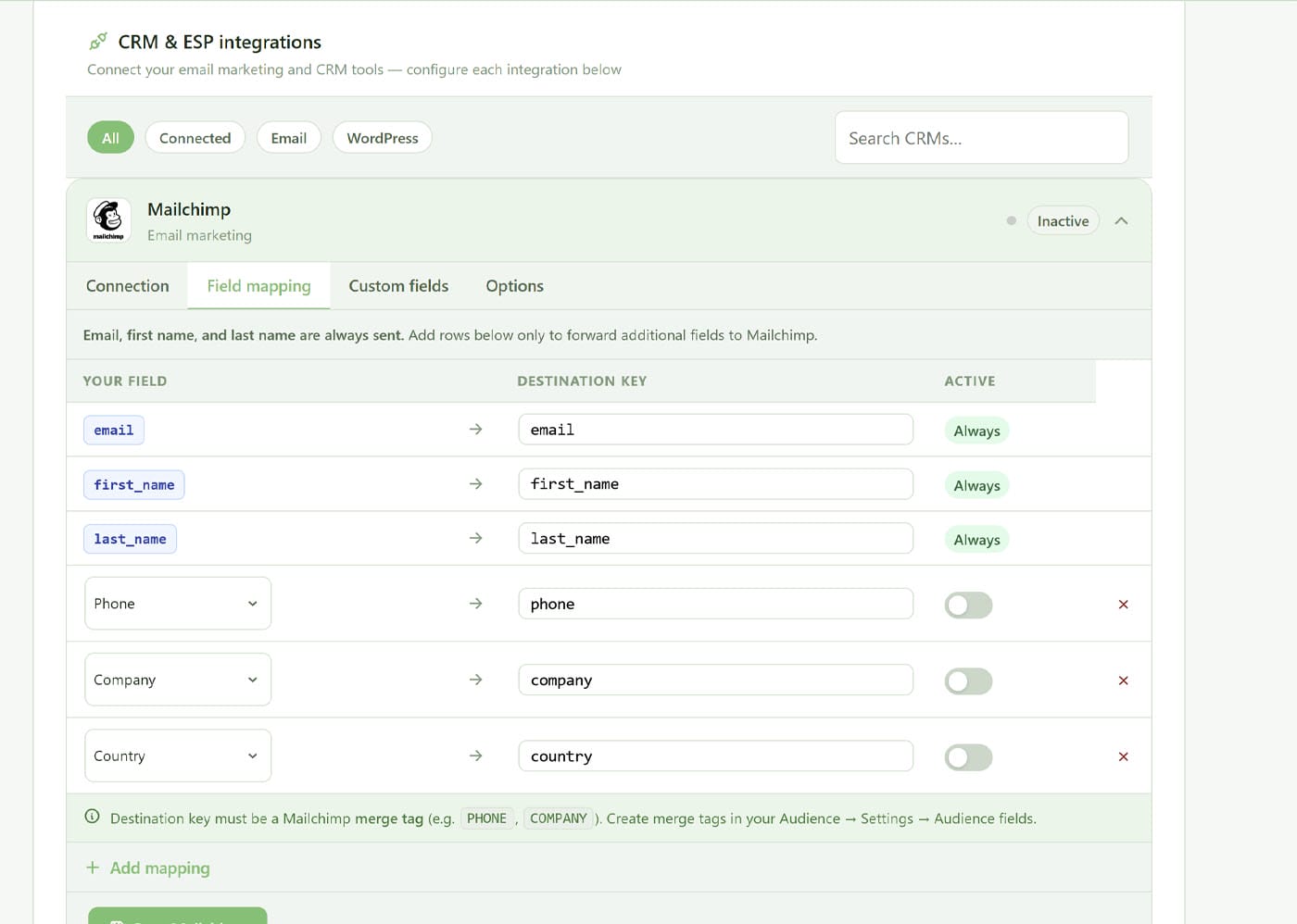 A web page showing CRM & ESP integrations settings for Mailchimp. The “Field mapping” tab is open, displaying mappings like email, first name, last name, phone, company, and country, with toggles for “Active” and options to add or remove mappings.
